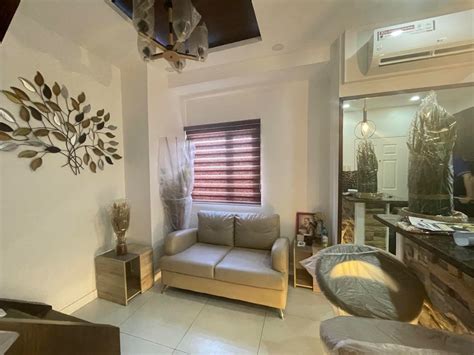 Cozy 2 bed unit in Victoria Tower Quezon City .